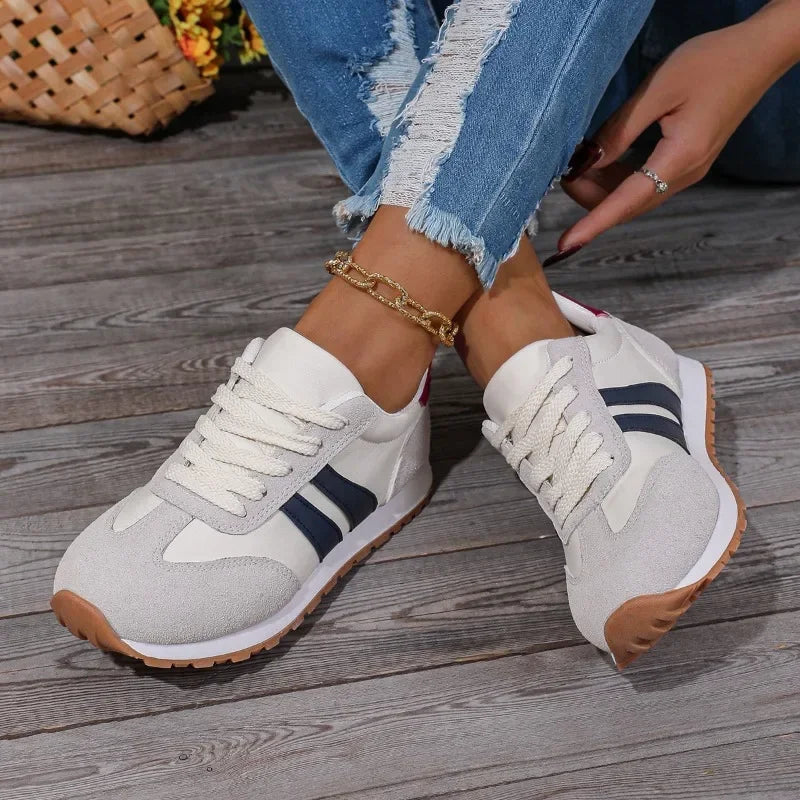 Stylish women's retro stripe colourblock sneakers, perfect for casual outings & athleisure.