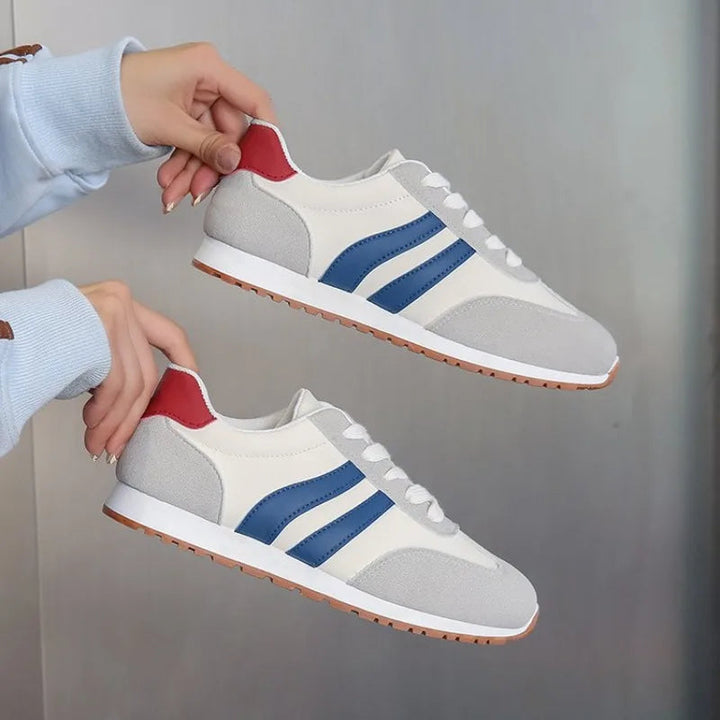 Vibrant colourblock & retro stripe women's lace-up casual sneakers for sporty comfort.