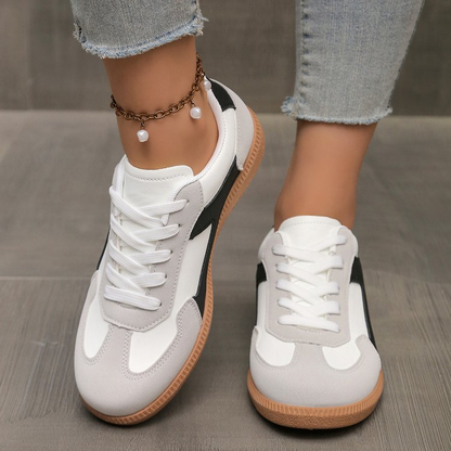 Comfortable women's retro sneakers with classic stripes, perfect for everyday walking and street style fashion.