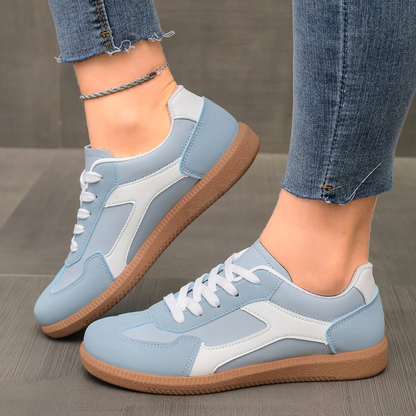 Fashionable women's vintage sneakers featuring a striped design for ultimate comfort & casual footwear.