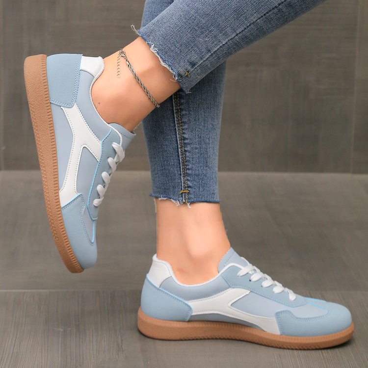 Stylish women's retro sneakers in a striped pattern, ideal for all-day comfort, casual, & everyday use.