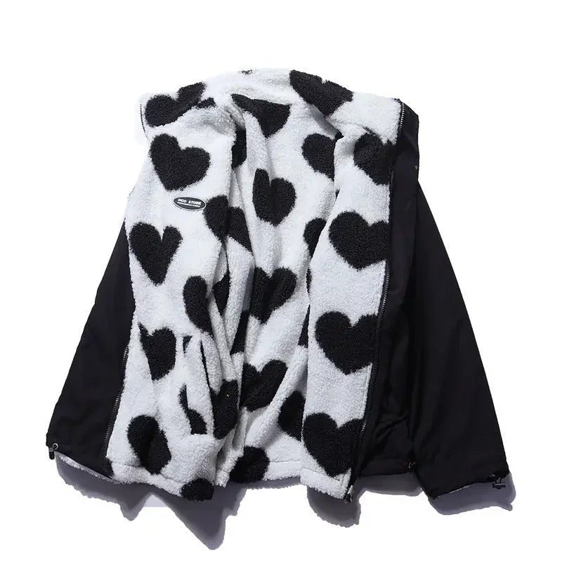 Stylish women's outerwear: a reversible jacket with heart print, ideal for casual occasions.