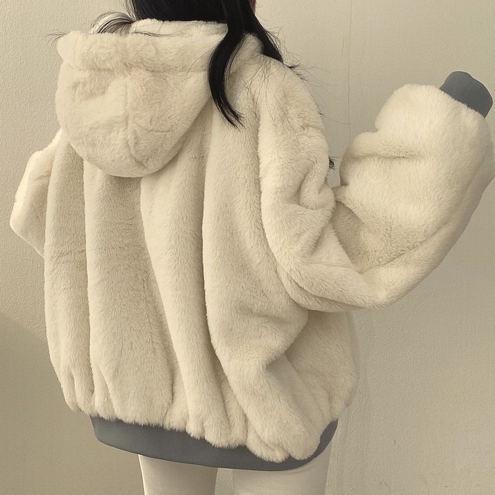 Versatile women's reversible hooded jacket, suitable for cozy casual everyday fall & winter looks.