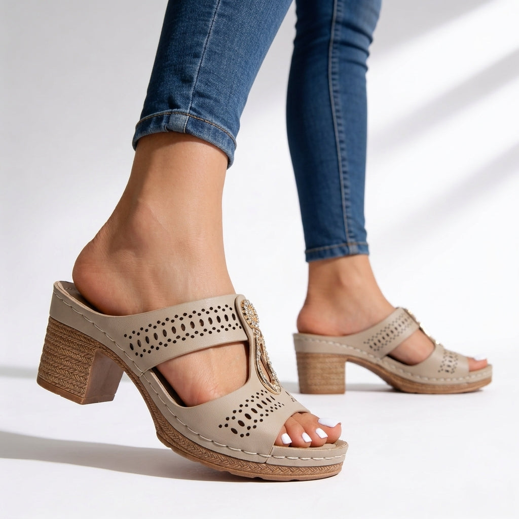 Stylish women's open-toe block heel sandals. Featuring sparkly rhinestone t-straps & cushioned platform for walking.