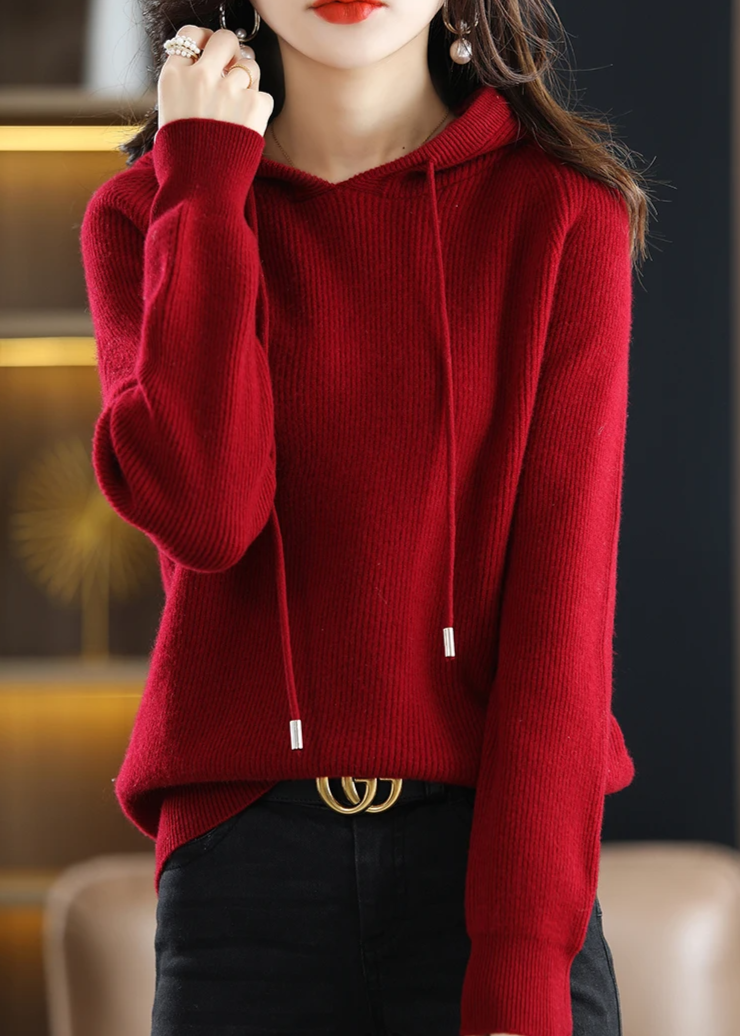 Textured ribbed knit women's pullover hoodie, offering effortless cozy style.