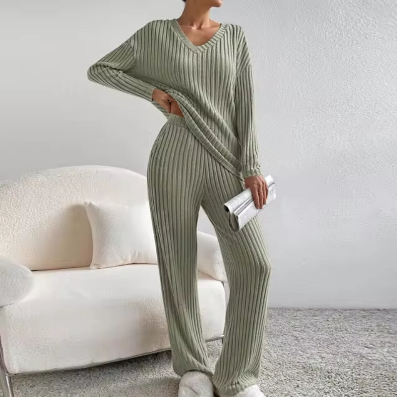 Matching women's ribbed two-piece set, featuring a V-neck top & coordinated pants for casual style.
