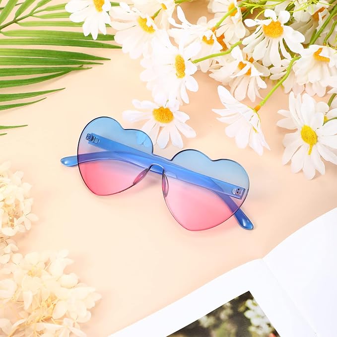 Clear lens women's rimless heart-shaped sunglasses, ideal for trendy partygoers.