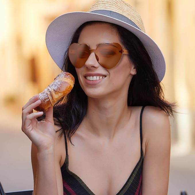 Adorable women's rimless heart-shaped transparent sunglasses, perfect for a cute summer vibe.