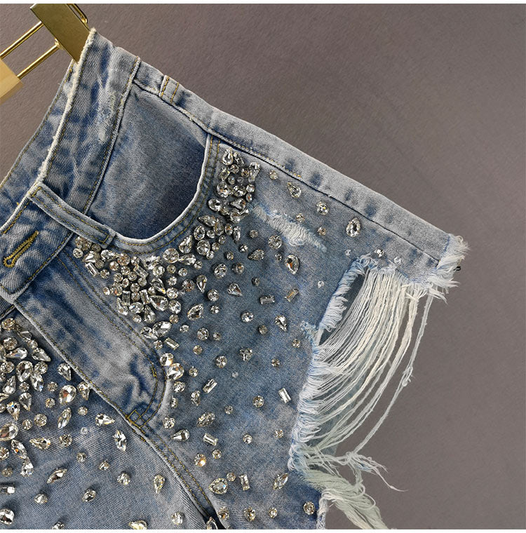 Summer fashion: Women's wide-leg ripped shorts for a cool and trendy look.