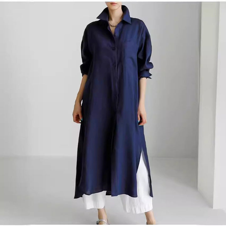 Elegant women's midi dress with a button-down design and functional roll sleeves, suitable for various occasions.