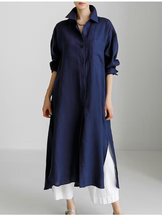 Casual women's midi shirt dress with easy roll sleeves and full button closure, perfect for relaxed spring days.