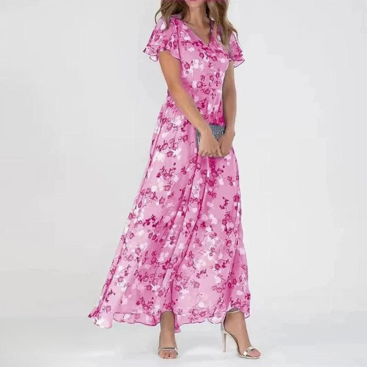 Elegant women's floral print maxi dress with flutter sleeves. Perfect V-neck vacation or party dress for spring.