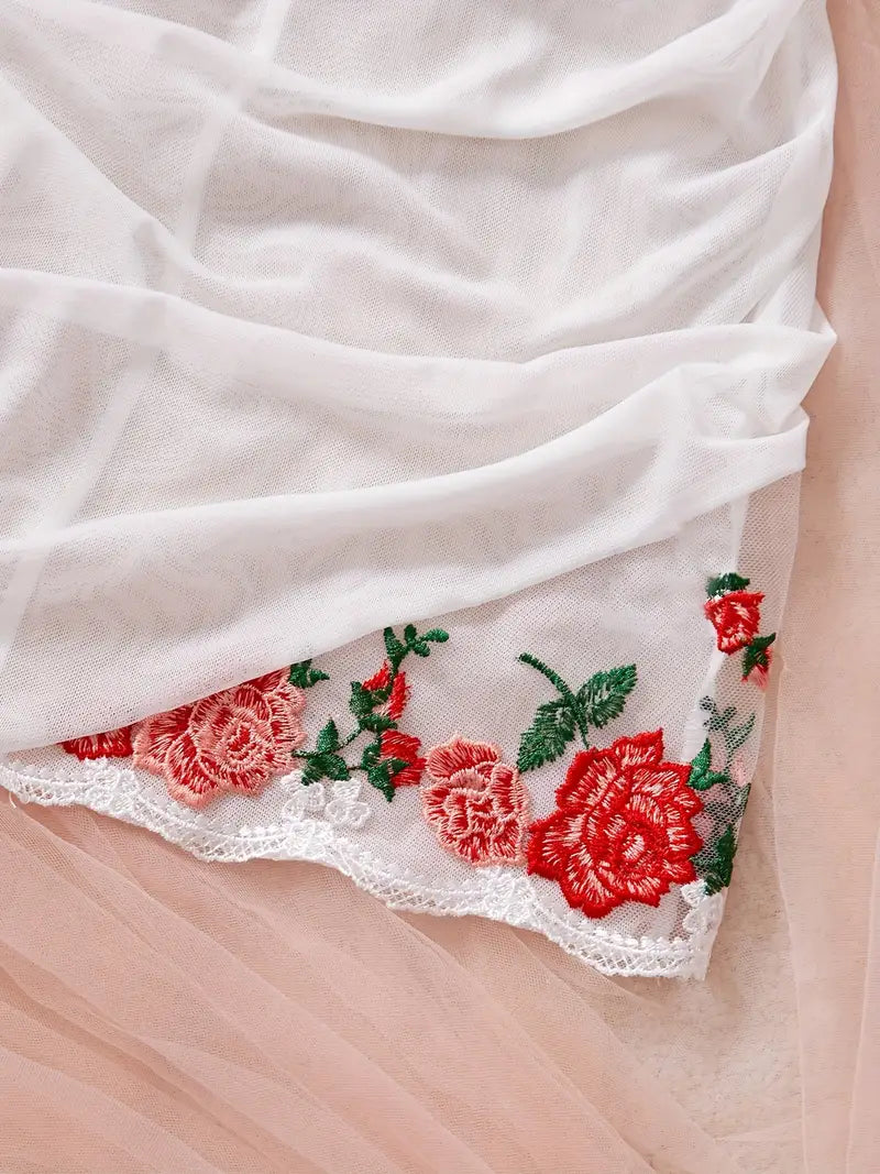Lightweight women's mesh nightgown, featuring romantic ruching and delicate style.