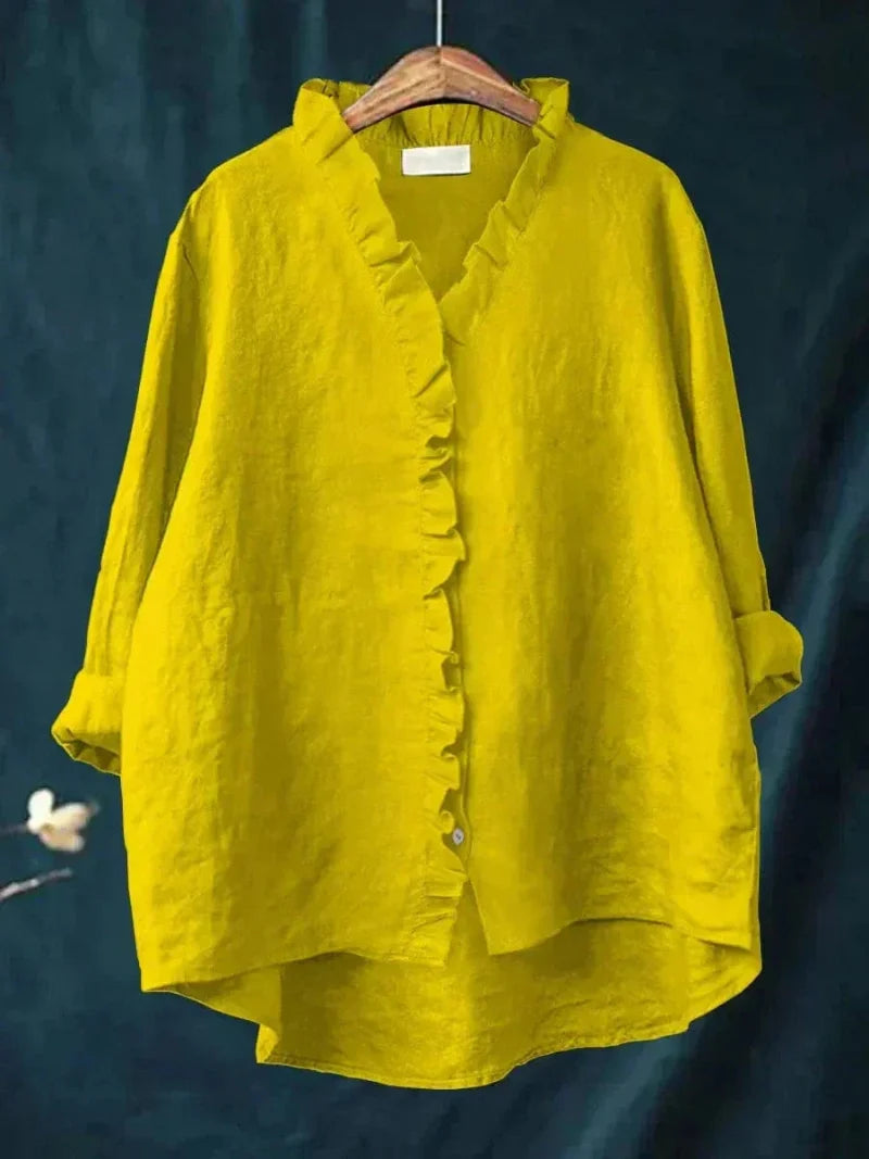 Ladies long-sleeve collared ruffle blouse with relaxed fit, perfect for comfortable, chic everyday fashion.