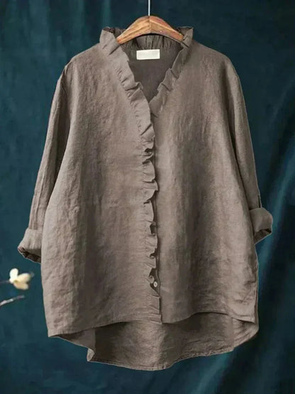Women's oversized ruffle blouse, long sleeve, ideal for a relaxed fit and casual elegant fashion statement.