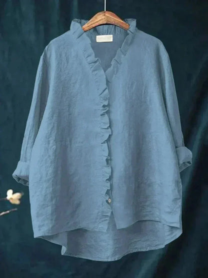 Romantic women's ruffle blouse, a chic long-sleeve top with a comfortable relaxed fit for everyday elegance.