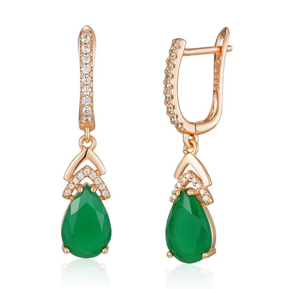 Dazzling women's rose gold pavé teardrop gemstone earrings. Perfect elegant dangle jewelry for any occasion.
