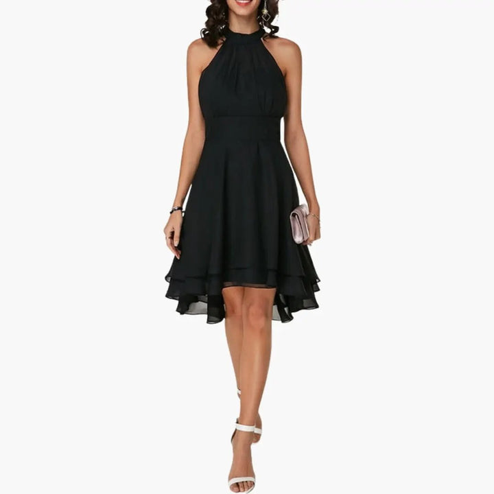 Women's round neck sleeveless dress with ruffle detail, perfect knee-length summer casual wear. Flattering fit.