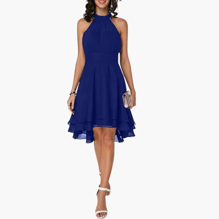 Elegant women's sleeveless ruffle dress. Versatile round neck knee-length design, ideal for day or casual wear.
