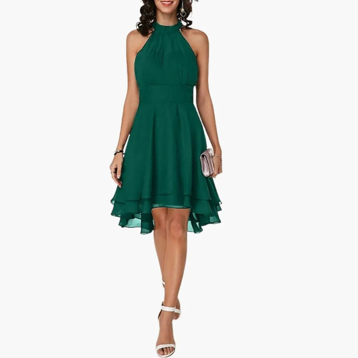 Casual women's summer dress, sleeveless with a round neck and pretty ruffle detail. Comfortable knee-length fit.