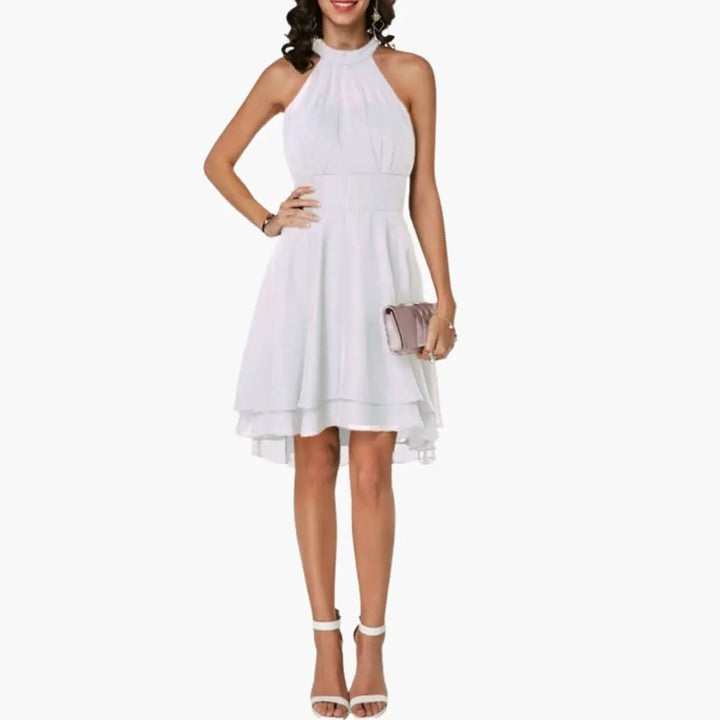 Stylish women's day dress, sleeveless with a classic round neck and delicate ruffle accents. Knee-length for comfort.