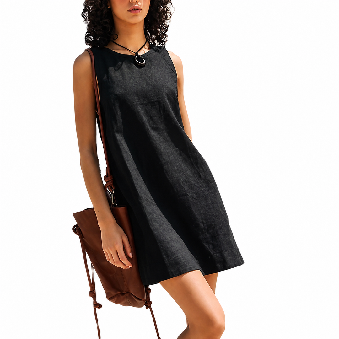 Elegant women's sleeveless shift mini dress. Perfect for warm weather, minimalist style & everyday comfort.