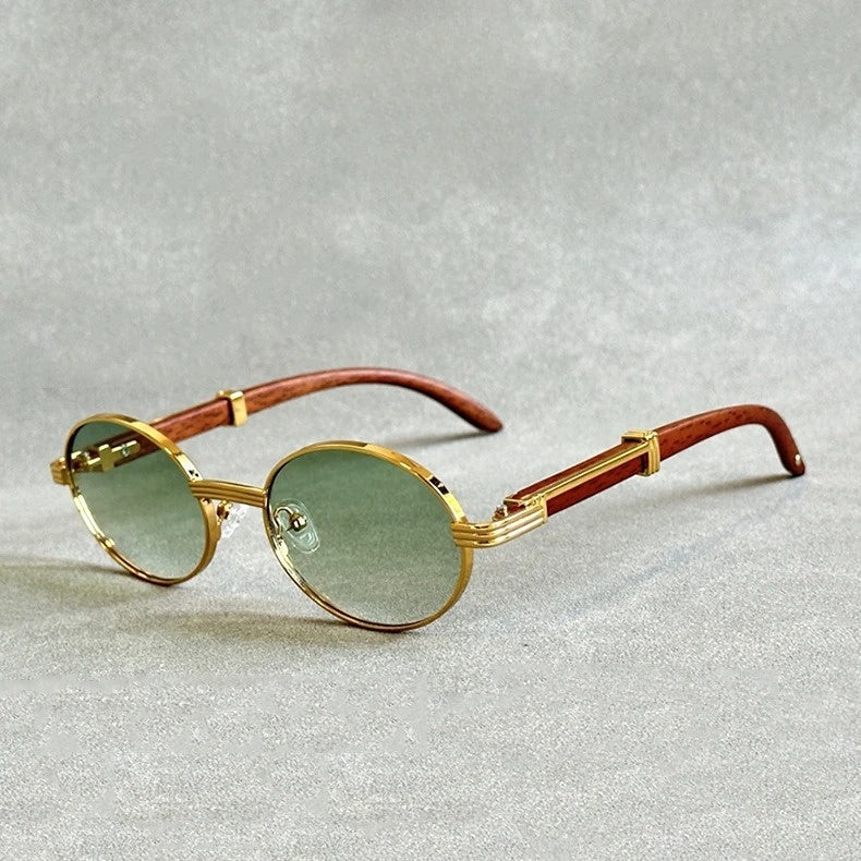 Chic women's round woodgrain sunglasses with silver accent. UV400 eyewear for summer. Vintage fashion accessory.