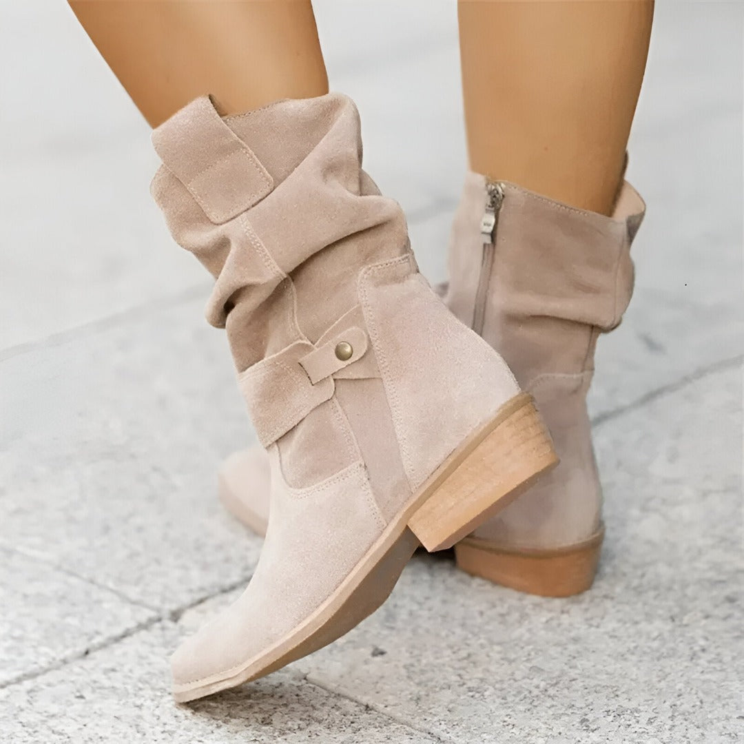Women's ruched ankle boots with cushioned comfort & practical side zip, perfect for fall and winter style.
