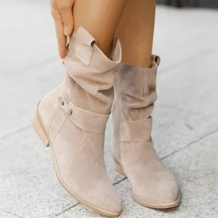 Fashionable women's ankle boots with distinctive ruched texture, cushioned support, and a functional side zip.