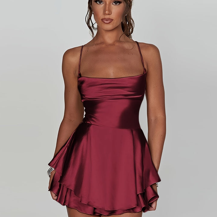 Charming women's ruched tiered mini dress. Perfect for homecoming, parties, and evening events.