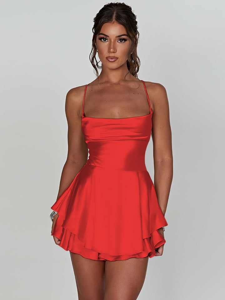 Party-ready women's ruched tiered mini dress. A festive choice for homecoming or cocktail events.