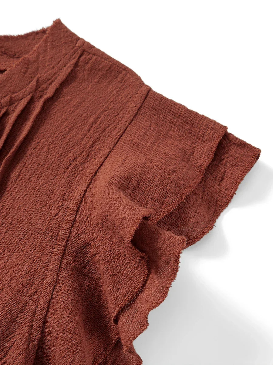 Women's crop top, perfect for summer holidays, featuring ruffles & flutter sleeves.