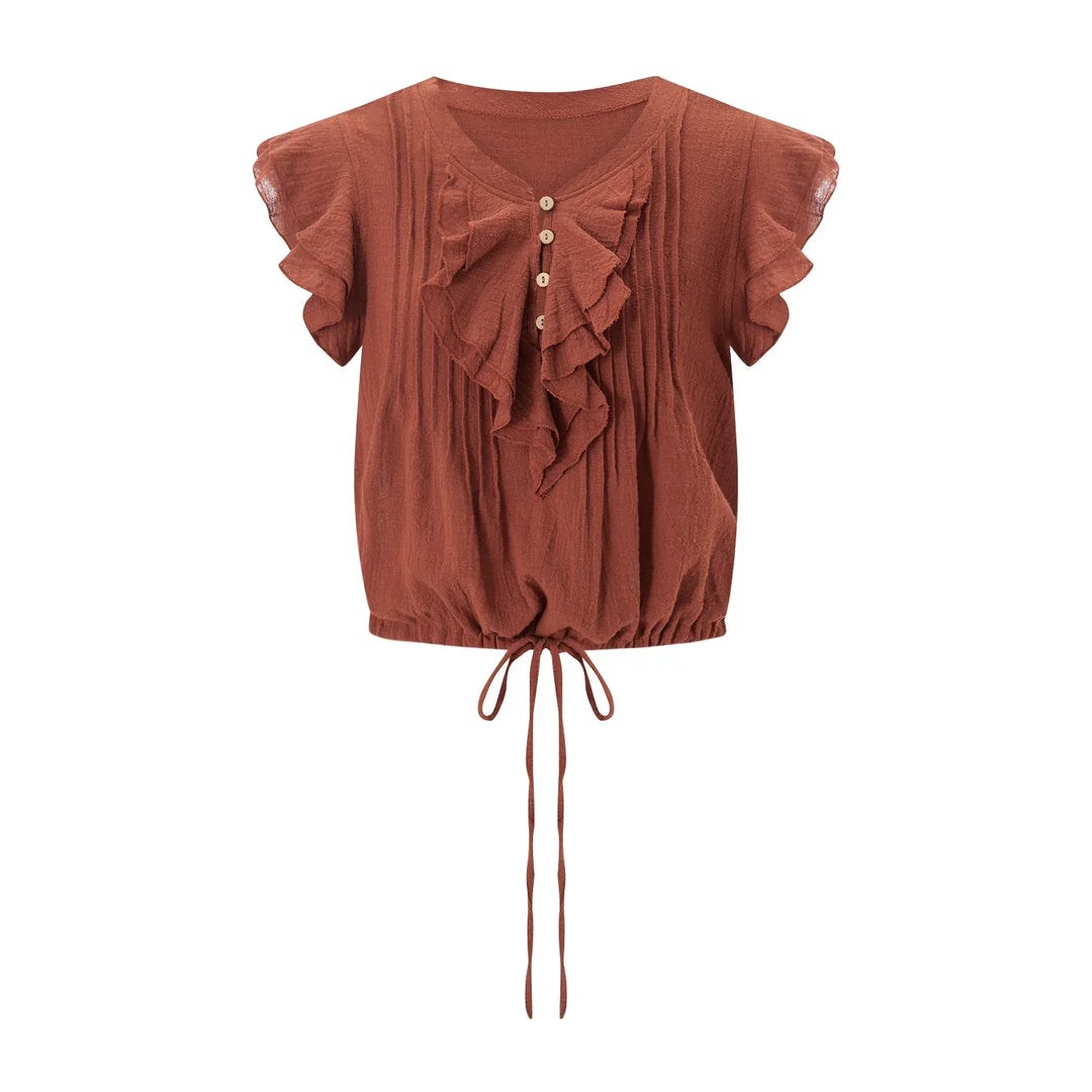 Summer casual women's top, lightweight, cropped, and featuring a ruffle front.
