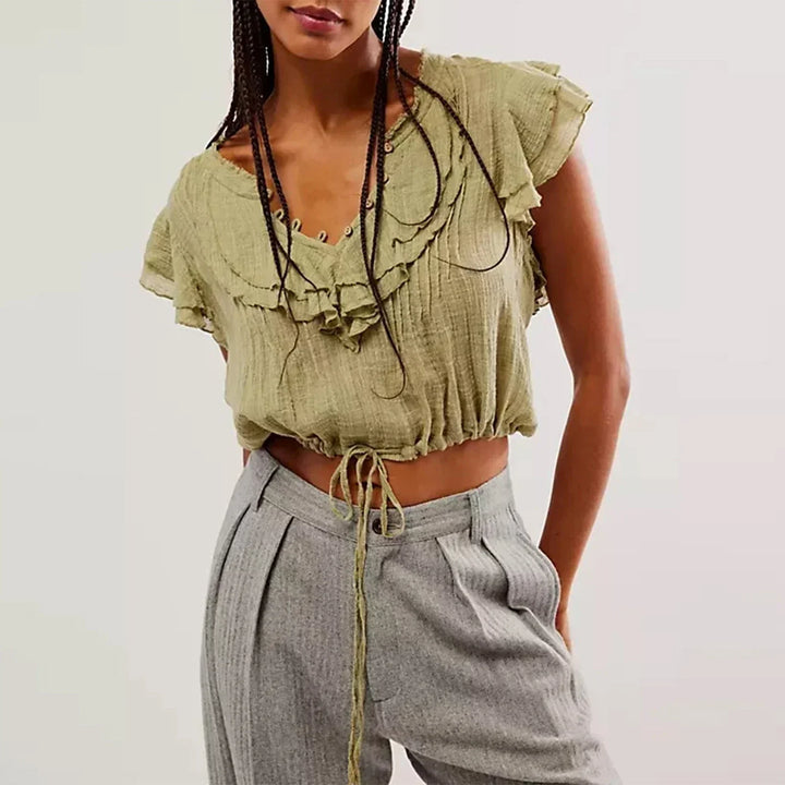 Women's summer shirt, cropped with a pretty ruffle front and flutter sleeves.