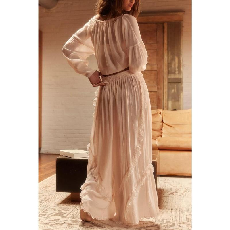Casual women's summer lounge set: ruffle trim cropped top & wide-leg pants. Breathable cotton blend two-piece set.