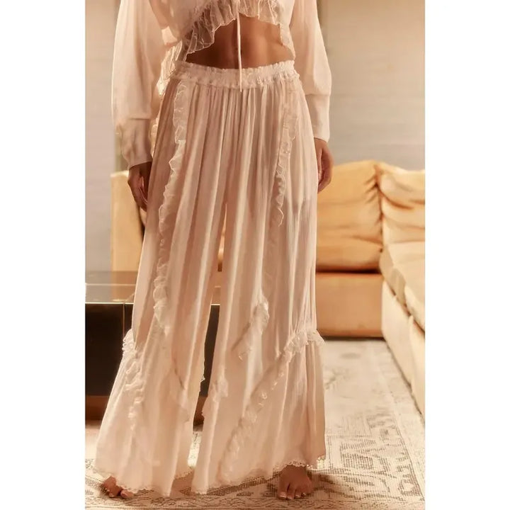 Elegant women's ruffle lounge set. Two-piece with wide leg pants & cropped top. Perfect comfortable casual wear.