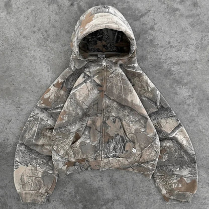 Women's rugged camo hoodie, perfect for versatile urban style or outdoor adventures.