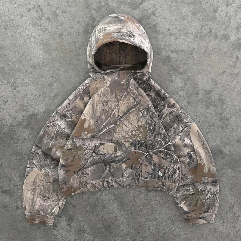 Stylish women's camo hoodie, a comfortable layering top for casual wear & streetwear fashion.