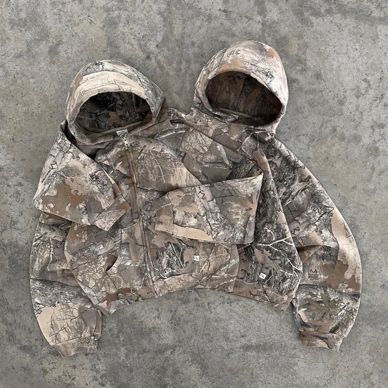 Durable women's camo hoodie, ideal outdoor apparel & adventure gear for active women.