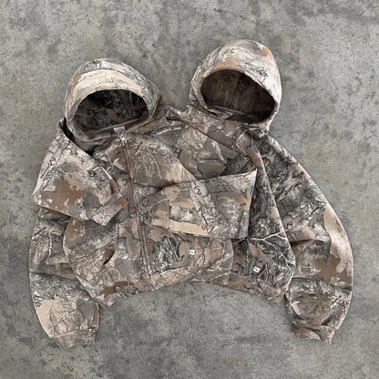 Durable women's camo hoodie, ideal outdoor apparel & adventure gear for active women.