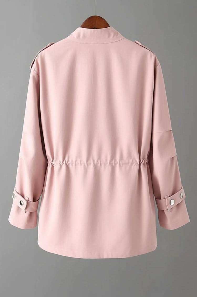 Modern women's fashion utility jacket with a stylish open back, designed for contemporary street style & versatile layering.