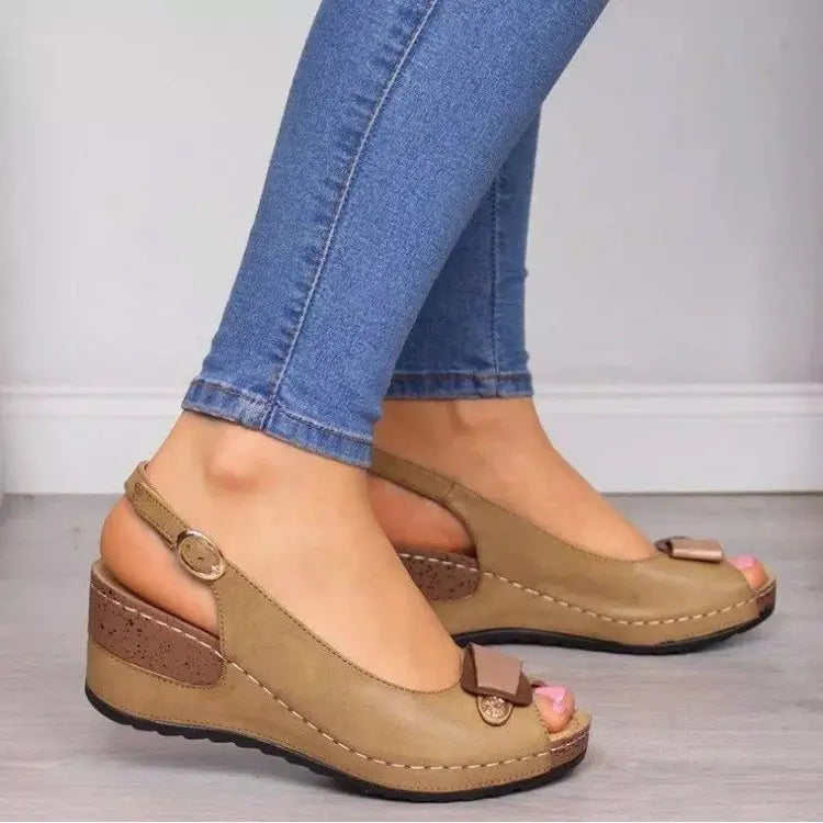 Woman wearing Savina Sling Wedges, demonstrating comfortable & chic style. Versatile footwear for everyday fashion.