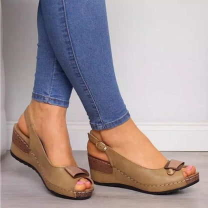 Pair of Savina Sling Wedges for women. All-day comfort, chic bow detail, versatile style. Perfect summer shoes.
