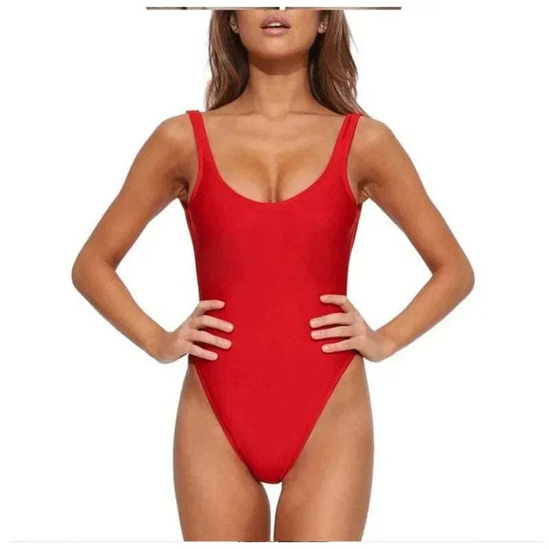 Modern women's swimwear: scoop neck, open back one-piece swimsuit designed for comfortable beach fashion.