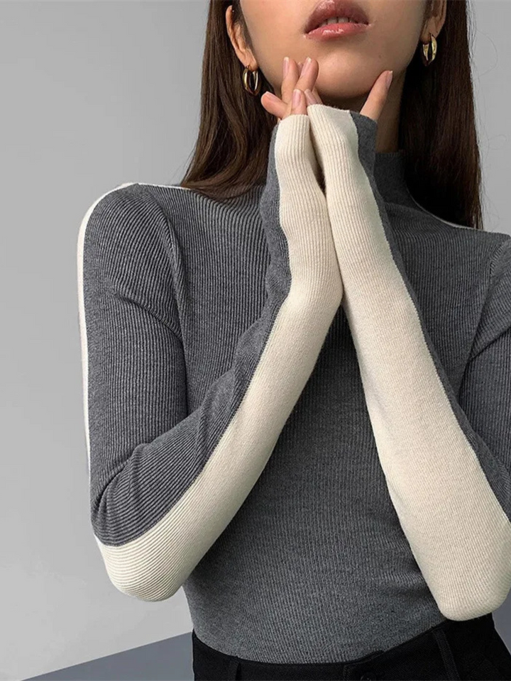 Chic women's turtleneck sweater, sculpted knit with contrast detail, perfect for fashion.