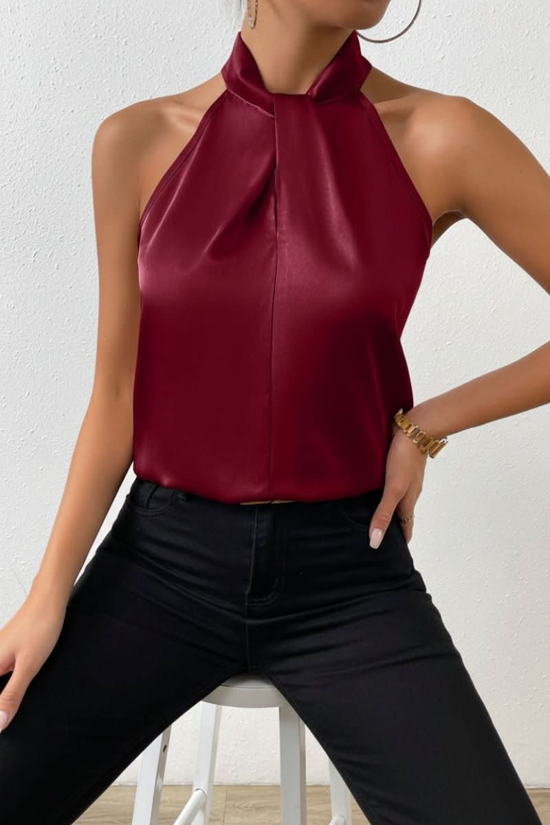 Summer fashion: Women's elegant sleeveless halter blouse, featuring a sculpted fit and decorative knot.