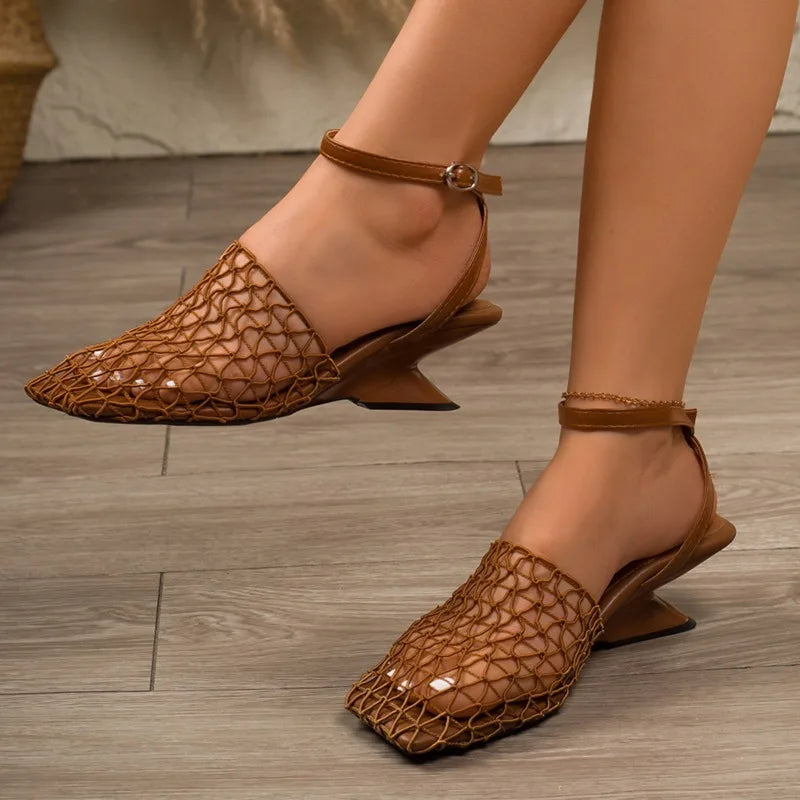 Sophisticated women's fashion heels, featuring a sculpted heel, pointed toe, and secure ankle strap.