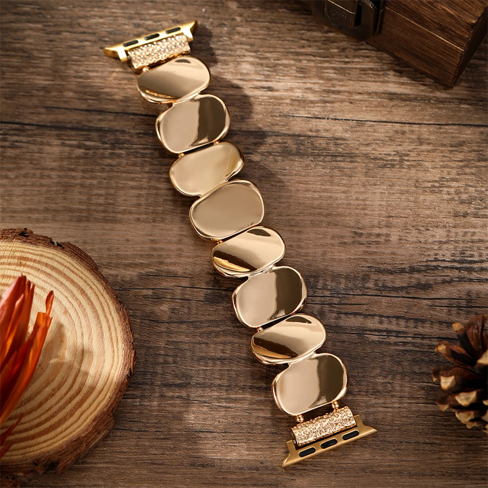 Elegant women's metal watch band with unique sculpted design, comfortable stretch fit.