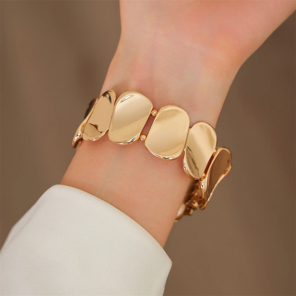 Jewelry-inspired sculpted metal smartwatch band for women, enhances device style.