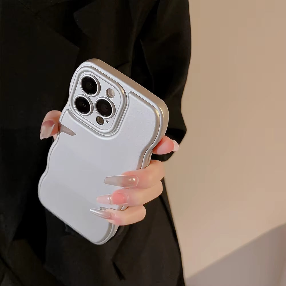 Chic women's tech accessory: sculpted ripple iPhone case with a glossy finish, engineered for shock protection.